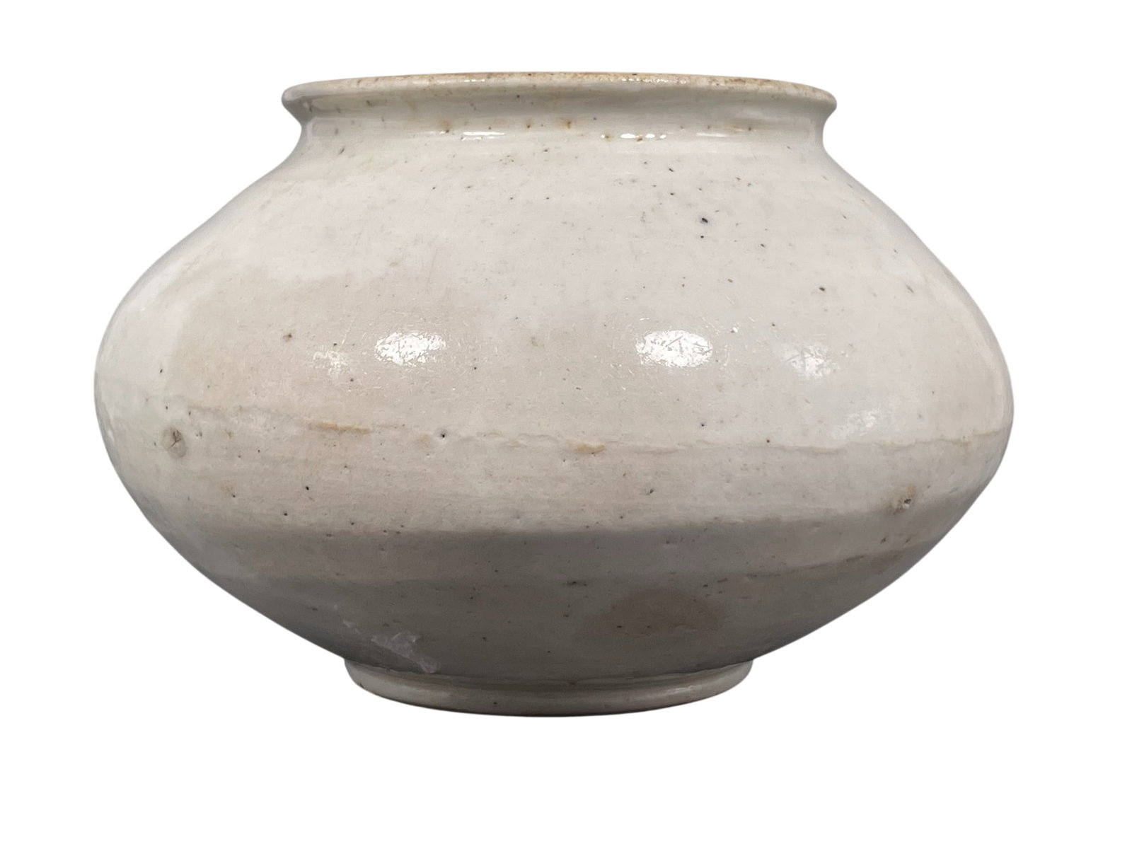 A Korean White-Glazed Jar: 3.1/4 in. high, 5 in. diam.
