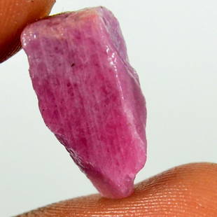 9.75 Carat Red Ruby Natural Unheated Specimen Rough Gemstone: Item Name:- Ruby, Item weight in carat:-9.75, item Dimension(Size)in milimeter:- 18 mm, 9 mm, 5 mm, item creation :- Natural, item country of origin :- africa, ITEM Treatment :- Not Enhanced, ********