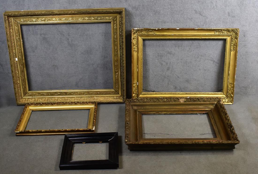 5 Vintage Picture Frames: 4 gilt and gesso. 34 3/4" H x 28 3/4" W in very good condition. 31 1/2" H x 23 1/4" W, 29" H x 21" W, and 14 1/4" H x 22" W with some loss of gesso. Along with contemporary wood frame, 12 1/4" H x 14 