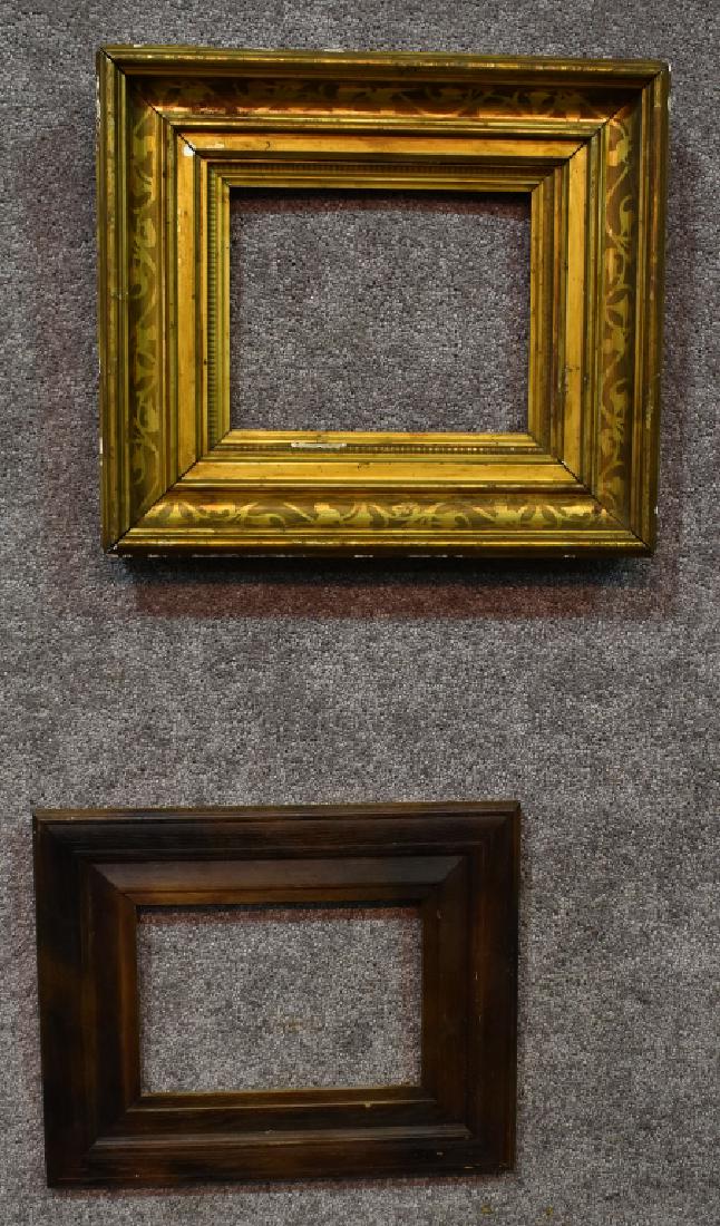 Two Picture Frames: Stained chestnut 16" H x 13" W. Acid etched gilt 17" H x 15" W.