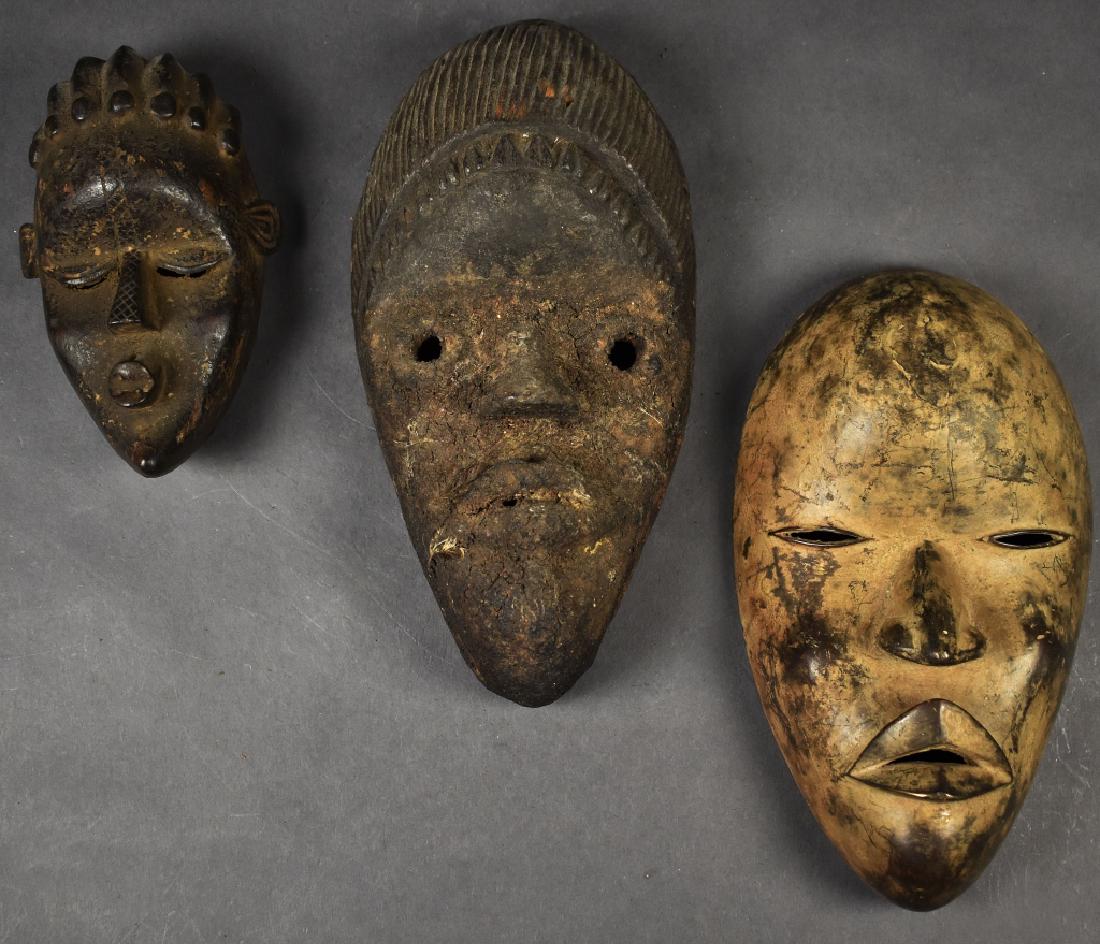 Three Dan Masks (one metal) (1 of 5)