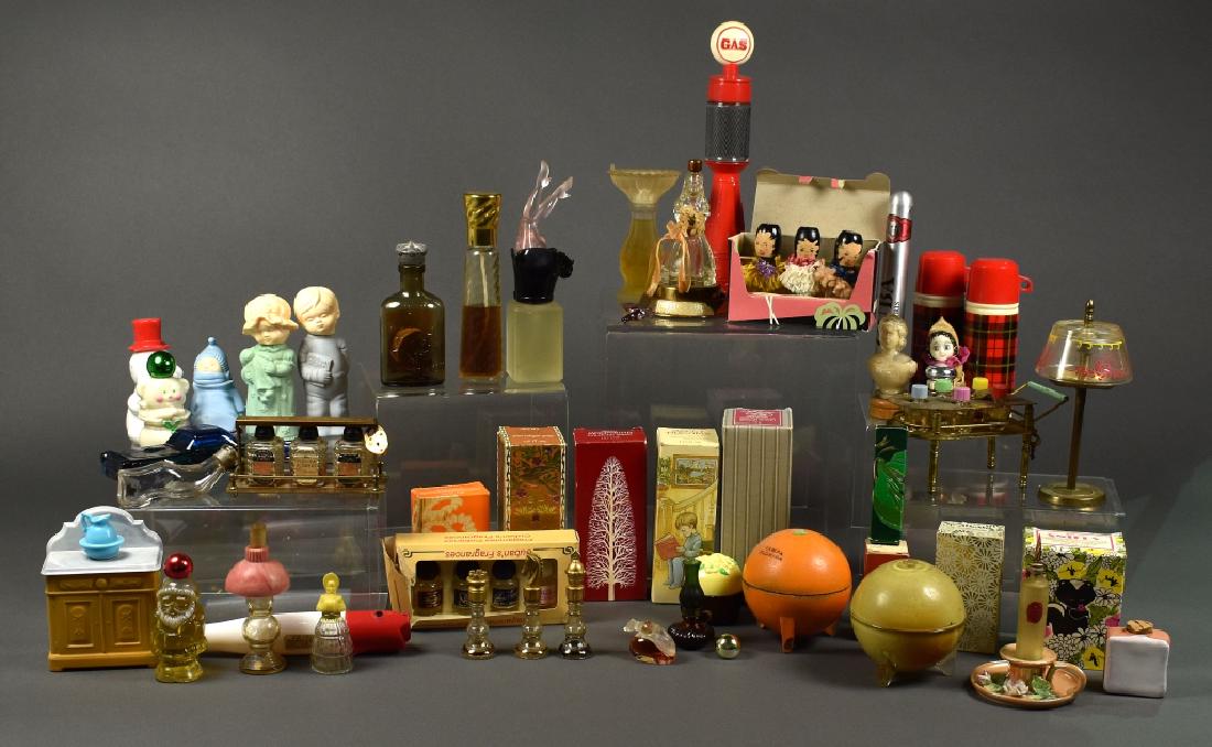 50+ Souvenir, Figural & Collectible Perfume Bottle: 1950's to modern. Over fifty bottles, including souvenir bottles from Cuba, Florida, Hawaii, Portugal, and Scotland. Many figural bottles by Mary Chess, Avon, and Apple Blossom. Many bottles still con