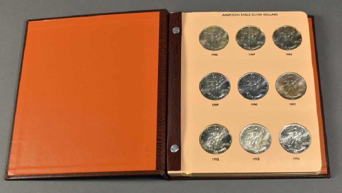Dansco Album Containing 22 Silver Eagles (1 of 4)
