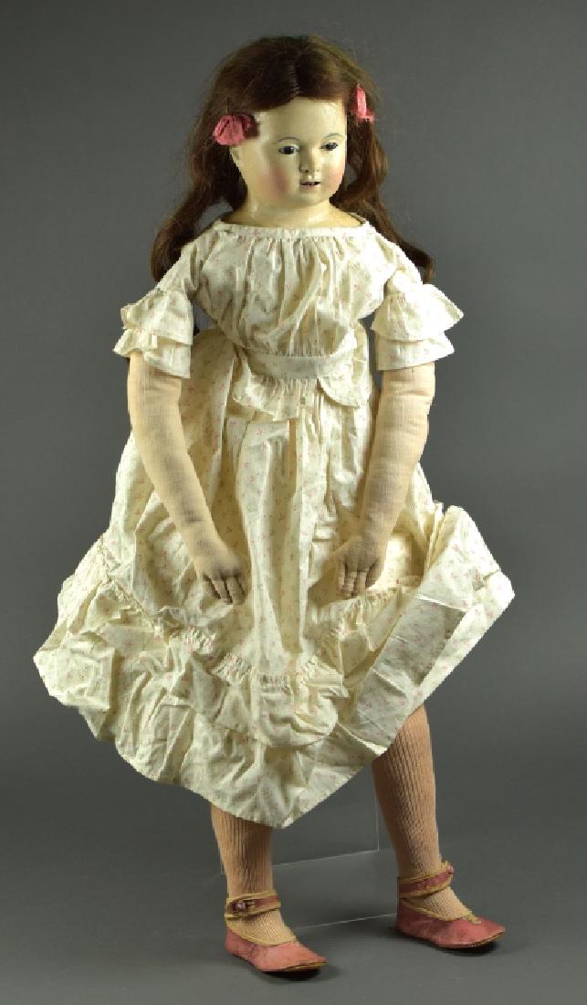 Papier Mache French Type Shoulderhead: 30". Repainted with glass eyes on new body. Vintage clothes and antique shoes.
