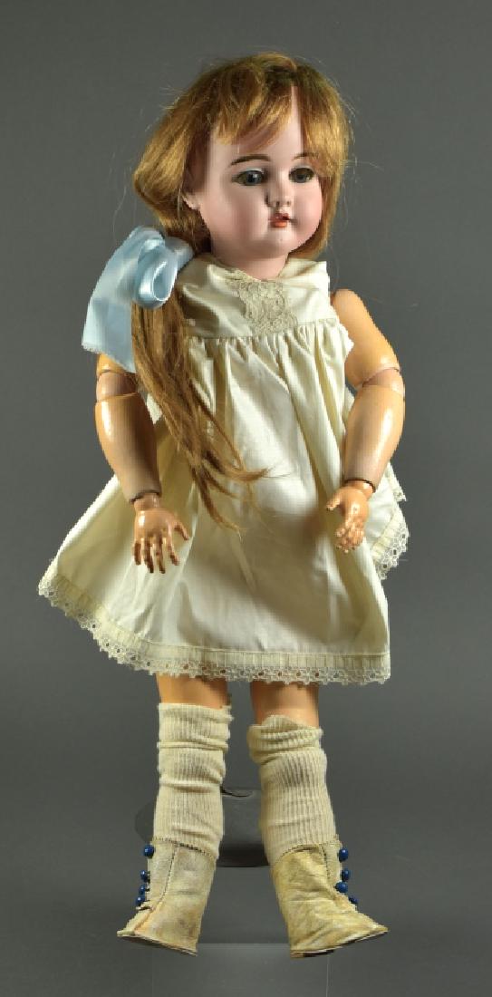 German Handwerck #421 Doll: 24". Blue sleep eyes, open mouth with teeth. Human hair wig, pierced ears. Composition and wood ball jointed body. Original finish and stamp. Undressed with antique boots.