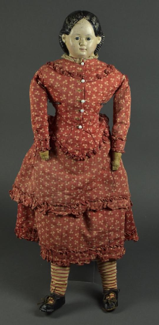 1858/1883 Papier Mache Greiner Doll: 26". Shoulderhead. Greiner of Philadelphia, Pa. Blue eyes, antique cloth body. Antique clothing and shoes. Very nice condition.