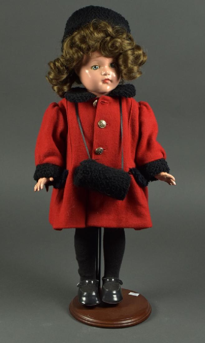 Effanbee Composition "Anne Shirley" Toddler: Blue sleep eyes, brown synthetic wig, tagged wrist bracelet. Dressed in red wool clothing and accessories. Composition is in very good condition. 21" H.