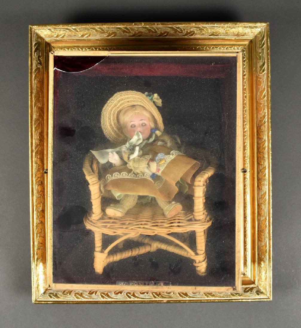 German All Bisque Kestner Doll: Marked "83/160. Brown sleep eyes and open mouth with teeth. Mohair wig. Tiny chip at joint of left leg. Otherwise excellent condition. Has a 2" detailed and dressed Parian. All clothing appears origin