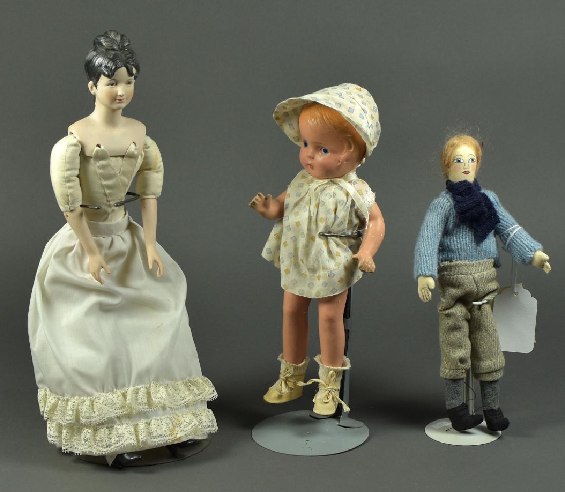 1989 Angeline Melvin Moravian William Artist Doll: 12" H. Along with a 12" unmarked Patsy-type composition with blue painted eyes and blonde molded hair. Excellent condition. Also includes an 18" artist reproduction of Parian lady.