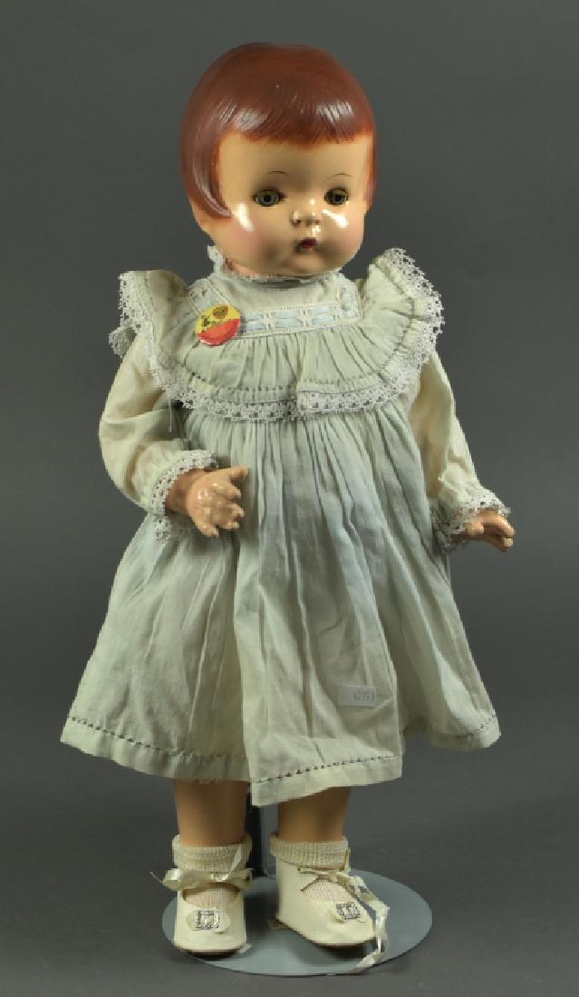 Effanbee Patsy Ann Composition Toddler: Blue sleep eyes, molded brown hair. Wears antique replaced clothing with Effanbee Patsy pin. No crazing to composition. 19" H.