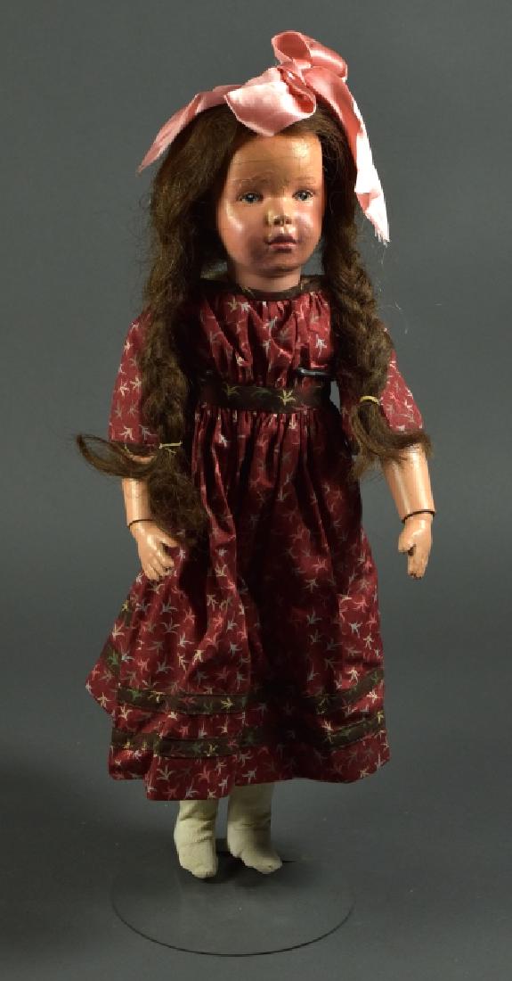 American Schoenhut Girl Doll: 19". Painted blue eyes, mohair wig. Wood jointed marked Schoenhut body. Face has some fill and repainted. Antique dress.