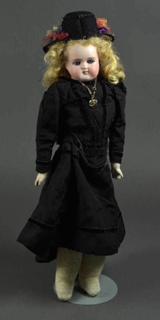 German Alt, Beck and Gottschalk #698 Girl Doll: 18". Shoulderhead. Blue sleep eyes, closed mouth, bisque lower ands. Kid leather body with lower cloth legs and feet, mohair wig. Very nice antique black gown and hat.