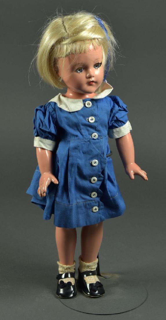Effanbee All-Composition American Child Doll: Blue sleep eyes and painted closed mouth. Possibly original dress, socks, and shoes. Composition is excellent except for one age line from corner left eye up about 1". Head and body marked "USA". 18"