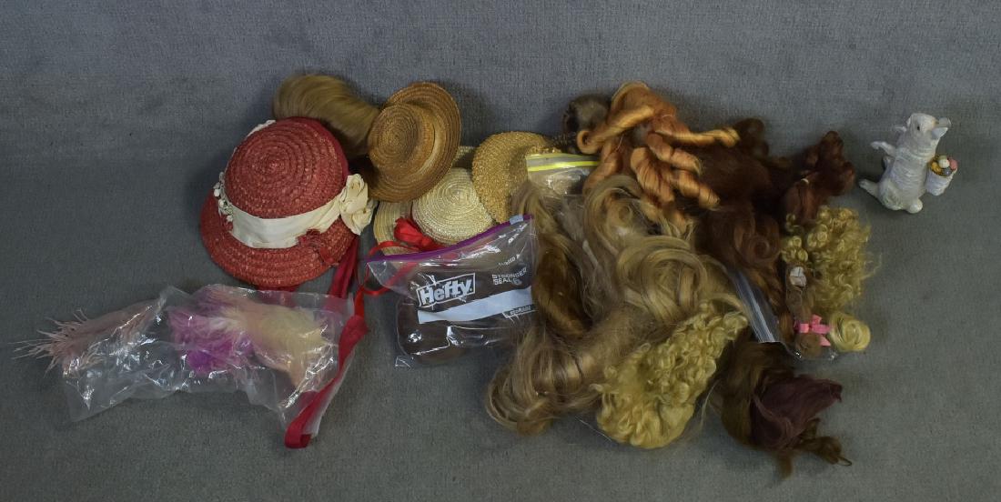 Small Box Lot of Doll Wigs and Hats: Assorted vintage hats/newer wigs.