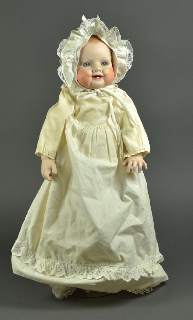 Reproduction Bonnie Babe Doll: Porcelain head and hands, cloth body.