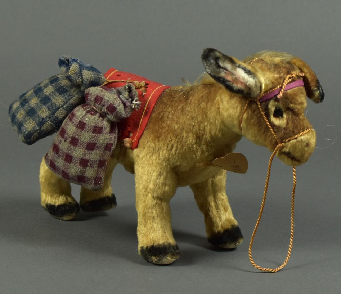 Hamiro Czech Donkey with Tags: Some moth holes in saddle.