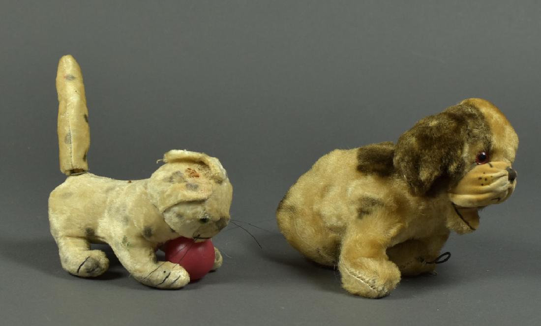 Vintage Japanese Wind Up Cat with Key: In working condition. Plus a plush dog with glass eyes.