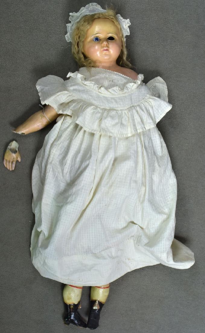 Wax Over Papier Mache Doll: Glass eyes. Missing one arm, other arm is broken, body as is. Damaged leg has become completely detached since being photographed and foot is broken.
