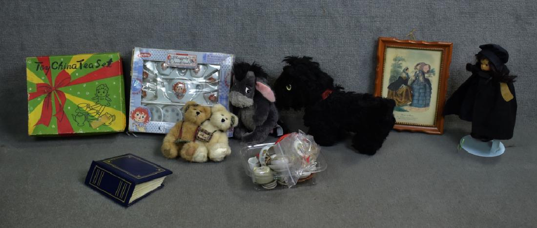 Miscellaneous Doll Household Items: Plush Scottie dog, Raggedy Ann tea set in box, wood doll box of doll tea sets.