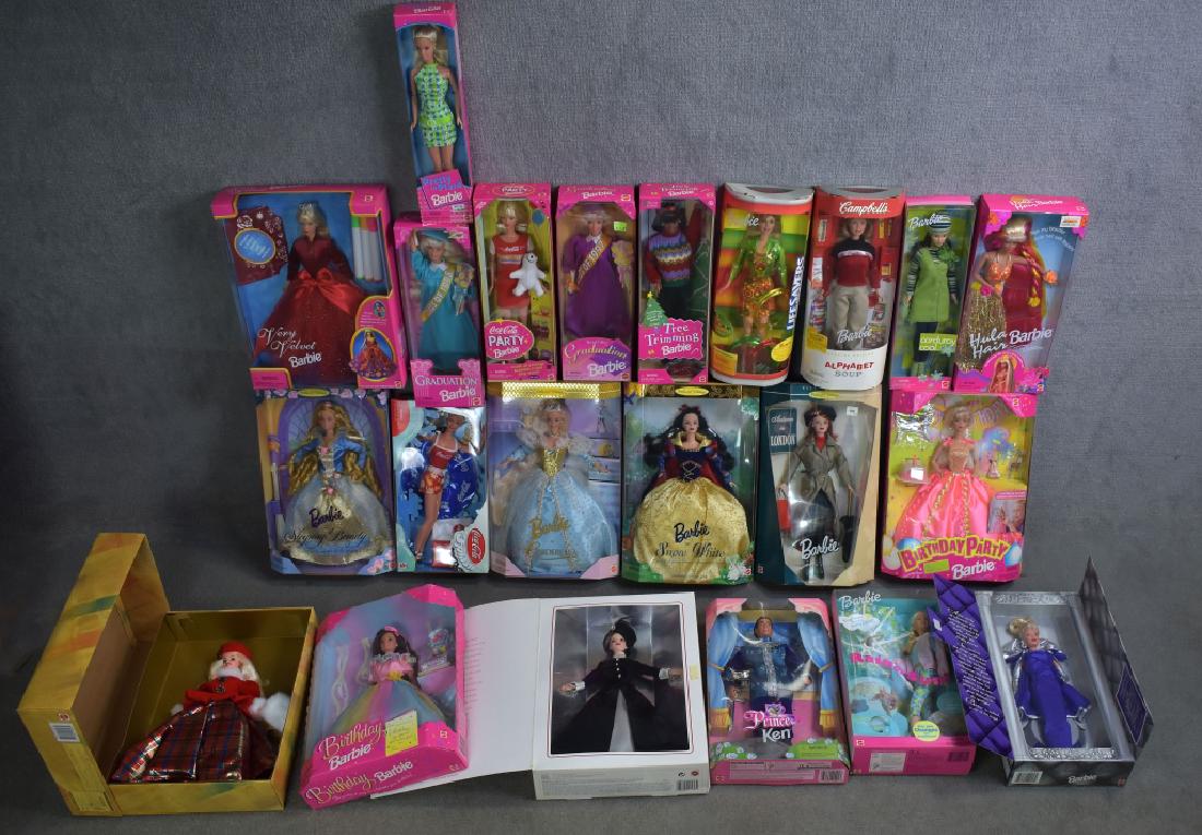 Twenty-two Barbies: Including Snow White, Cinderella, Prince Ken, Coca Cola, Tree Trimming, Jewel Princess and more.