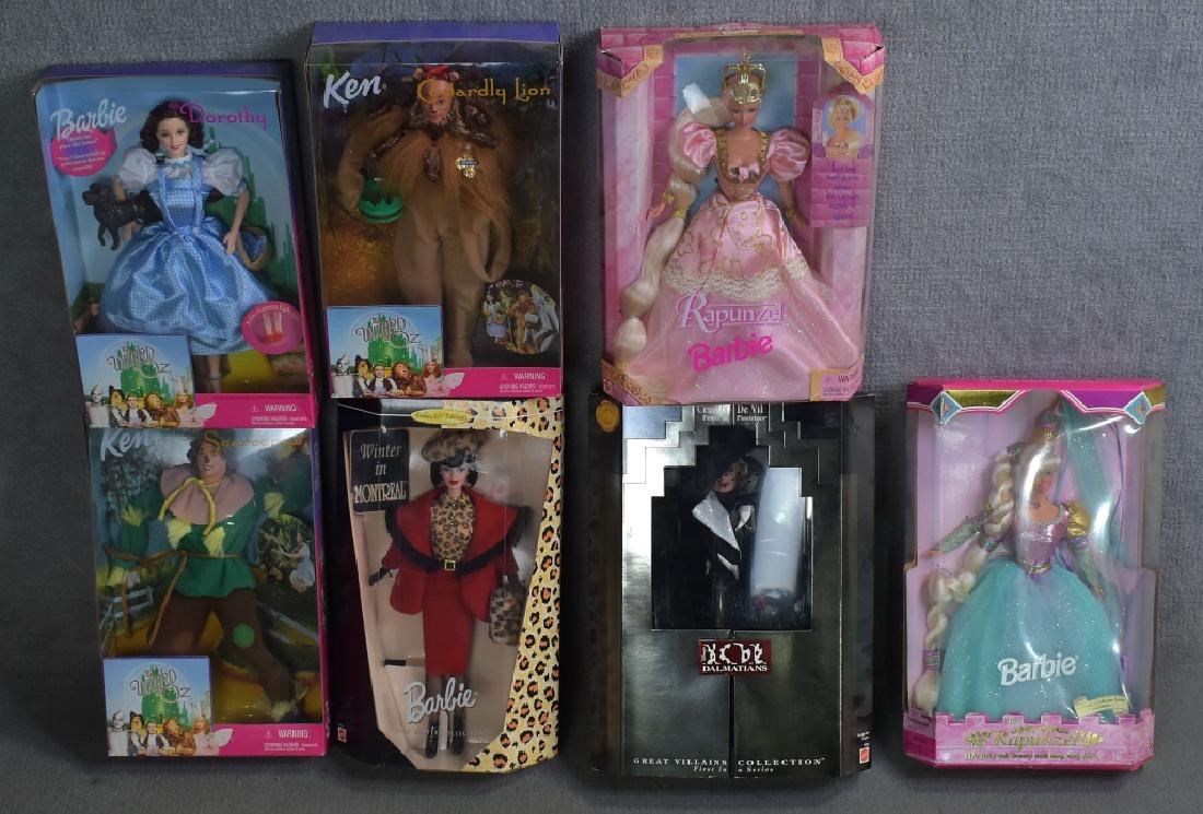 Seven Barbies Including Wizard of Oz: Dorothy, Tinman, Scarecrow, Rapunzel, Cruella deVil, plus more.