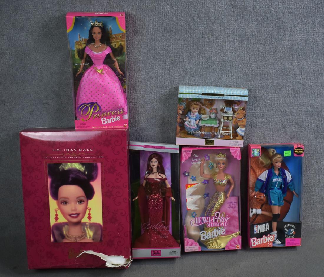 Six Barbies: Includes porcelain Holiday Barbie (damaged box ). Jewel Hair Mermaid, July Birthstone, and more.
