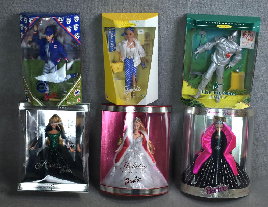 Six Barbies: Including Chicago Cubs, Ken as Tin Man, Holiday 1998, Celebration 2001, 2004 Holiday and 1999 Rome.