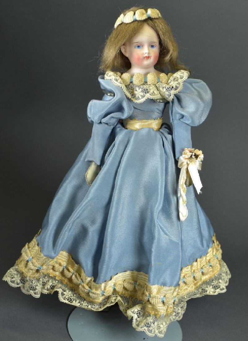 German Bisque Lady Doll: 11" bald head solid dome with human hair wig. Painted features, cloth body with leather hands. Vintage clothing.
