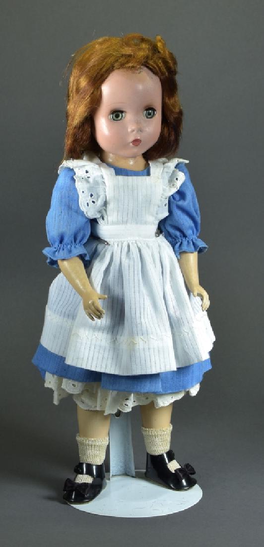 Madame Alexander "Alice In Wonderland": 14". Hard plastic with Maggie face. Ca 1948-1954, some mildew, replaced clothing.