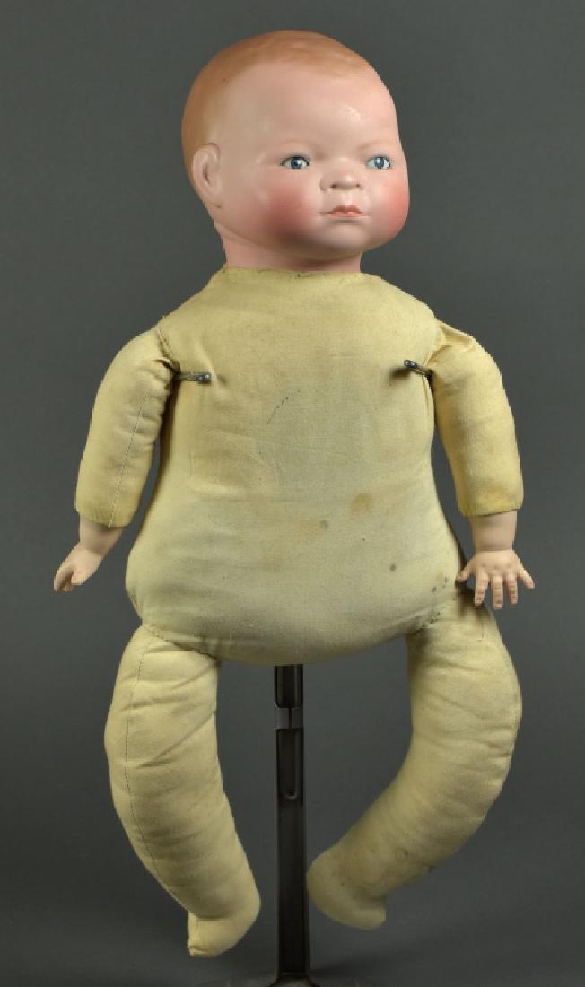 German Grace Putnam Bye-Lo Baby: Blue sleep eyes, painted dome head. Body has recovering with original crier, replaced porcelain hands.