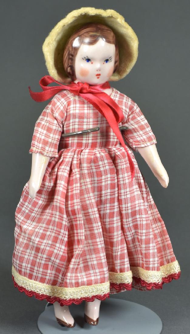 Ruth Gibbs China and Cloth Doll: 7". Original clothing and felt hat. No damage.