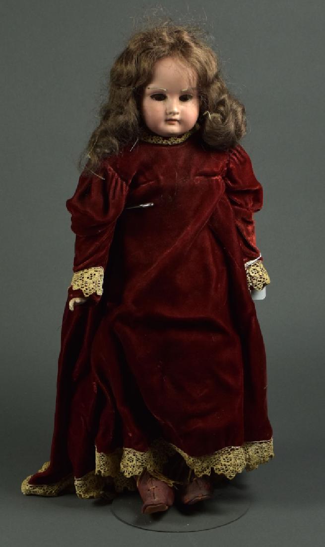 Armand Marseille AM "Floradora": Bisque shoulderhead on kidskin body, original bisque lower arms, repair to head. Dressed in old burgundy velvet and lace, human hair wig, missing mohair eyebrows, nice leather boots.