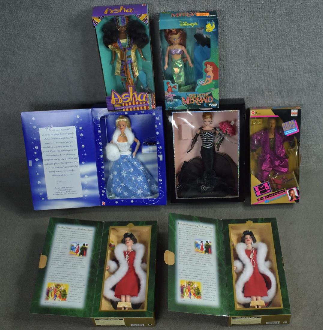 Variety of Barbies and Other Dolls: Total of seven dolls. Includes Barbie 40th Anniversary, Snow Sensation Barbie, Mattel MC Hammer, Tyco Little Mermaid, and more. Overall good condition.