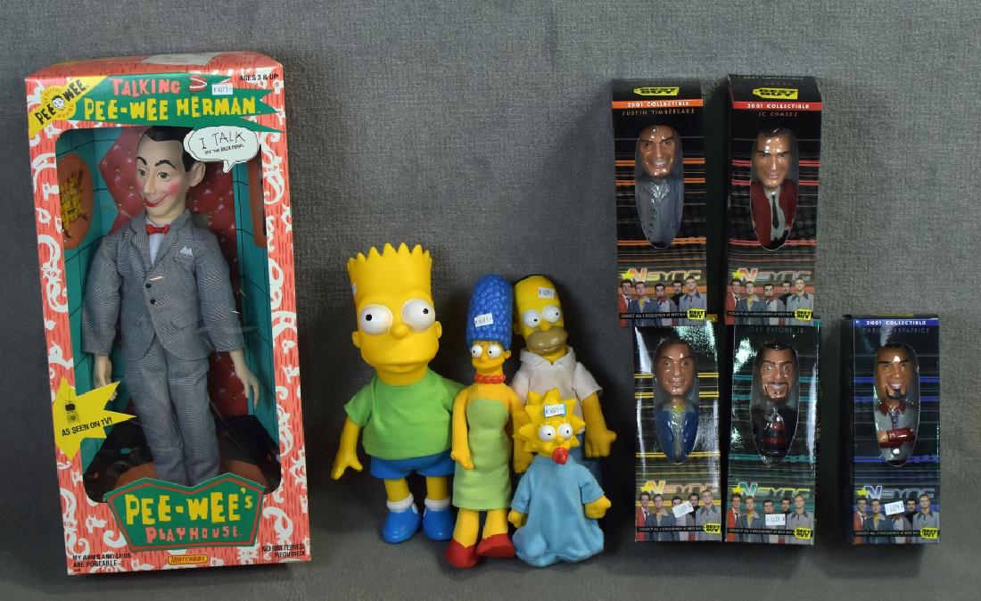 NIB Talking PeeWee Herman Doll and More: PeeWee made by Matchbox, string pull talker works, however cardboard is torn on the inside from the string being pulled. Along with complete set of Best Buy Nsync Bobble Heads an Simpsons toys which d