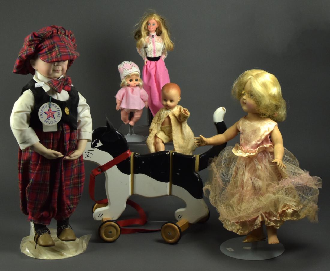 Ideal P-91 Toni Doll and More: Toni is in fair condition and needs cleaning. Along with a bisque boy doll wearing plaid and a pull along wooden cat. Overall fair to good.