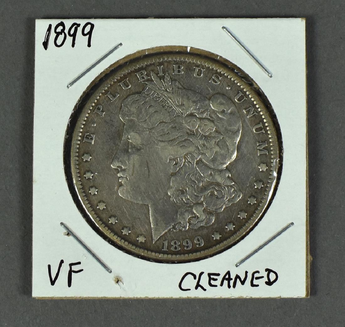 1899 Morgan Dollar This scarce semi-key issue grades (1 of 2)