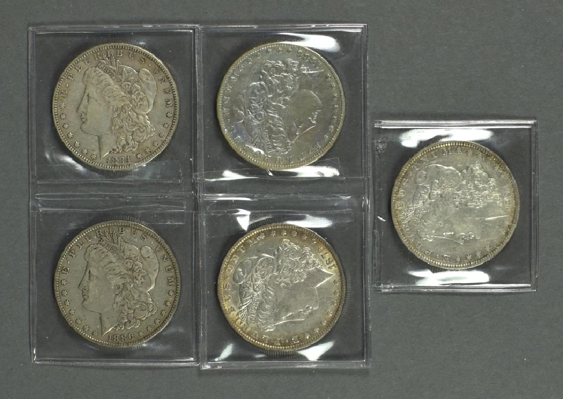Five Morgan Dollars in Various Circulated Grades Dates (1 of 2)