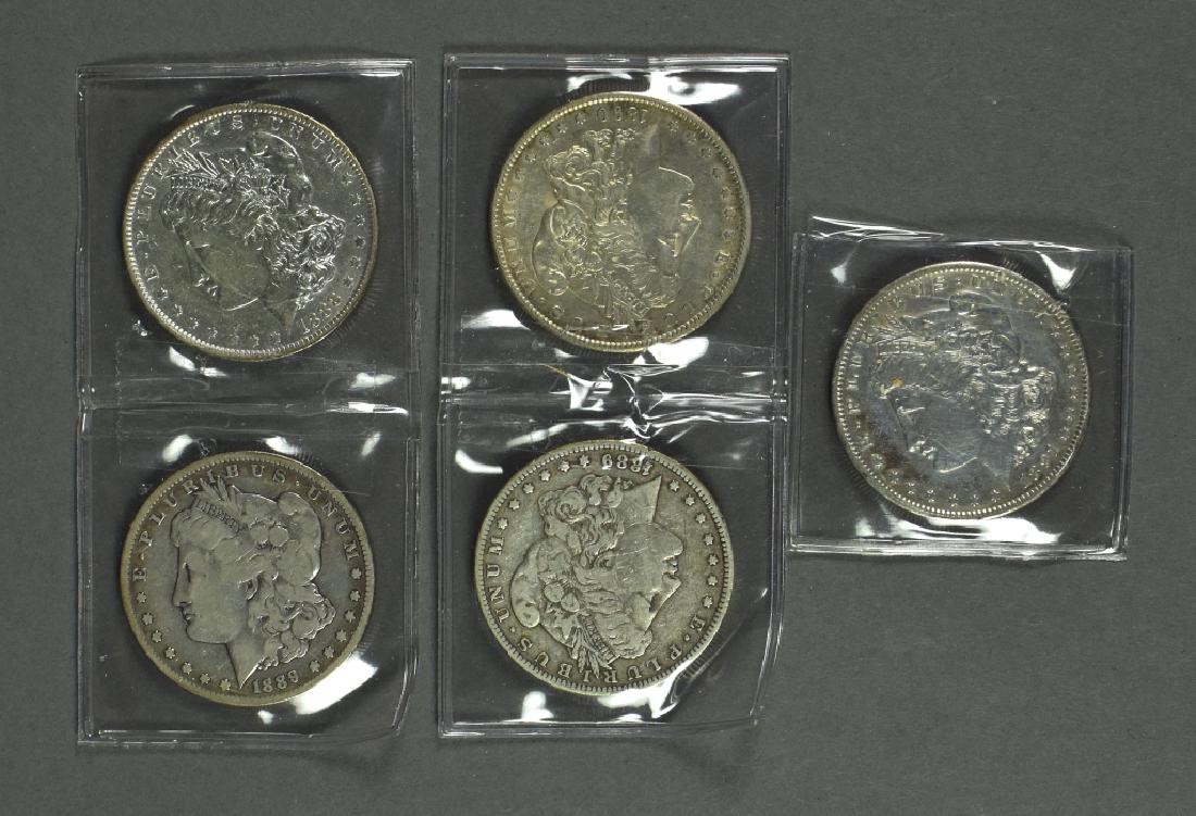 Five Morgan Dollars in Various Circulated Grades Dates (1 of 2)