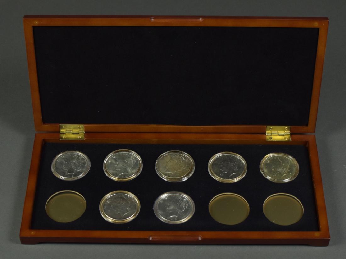 Group of Seven Peace Dollars Grades range (1 of 3)