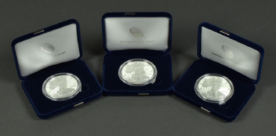 Three Proof Silver Eagles Dates are 2014, 2016 and (1 of 4)