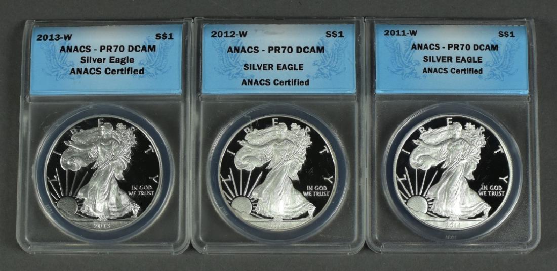 Three Proof 70 DCAM Silver Eagles All graded by ANACS. (1 of 2)