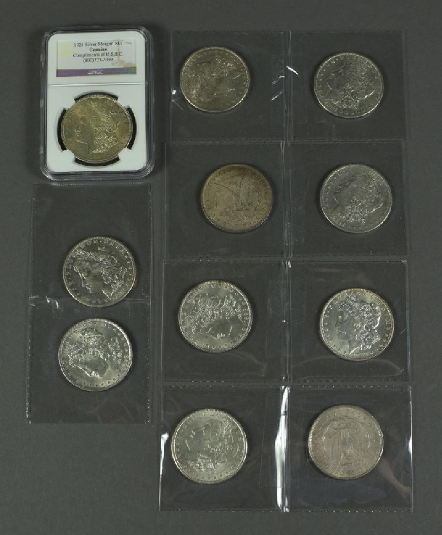 Eleven Morgan Dollars Four are dated 1897-S.  All are (1 of 4)