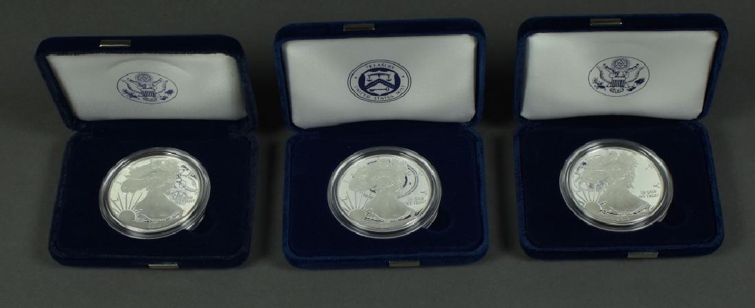 Three Proof Silver Eagles In mint boxes; dates are (1 of 4)