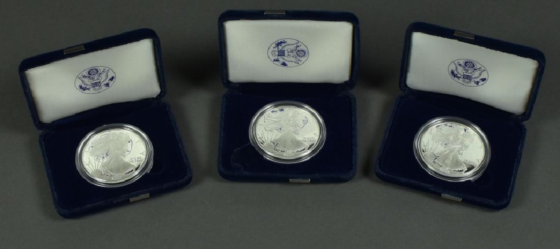 Three Proof Silver Eagles In mint boxes; all dated (1 of 4)