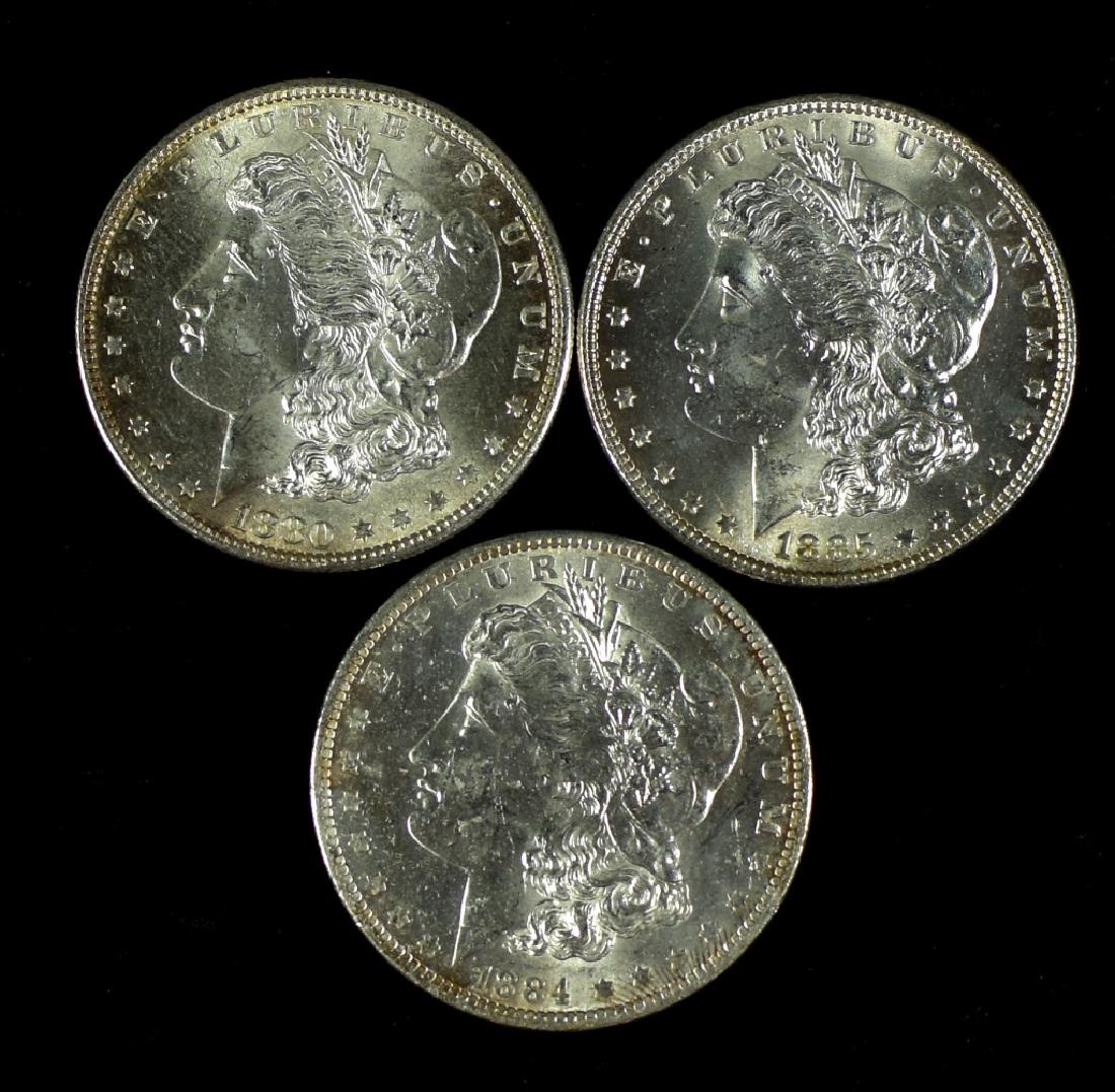Three Morgan Dollars 1880S MS 63+, 884D MS 62-63, 1885 (1 of 2)
