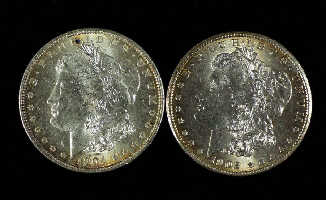 1902 O and 1904 O Morgan Dollars Both MS63+. (1 of 2)