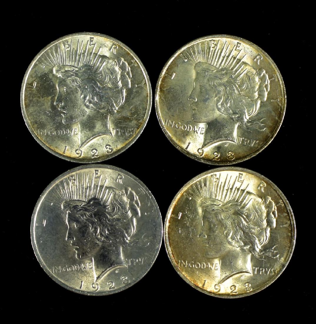 4 Uncirculated 1923 Peace Dollars MS62-63. (1 of 2)