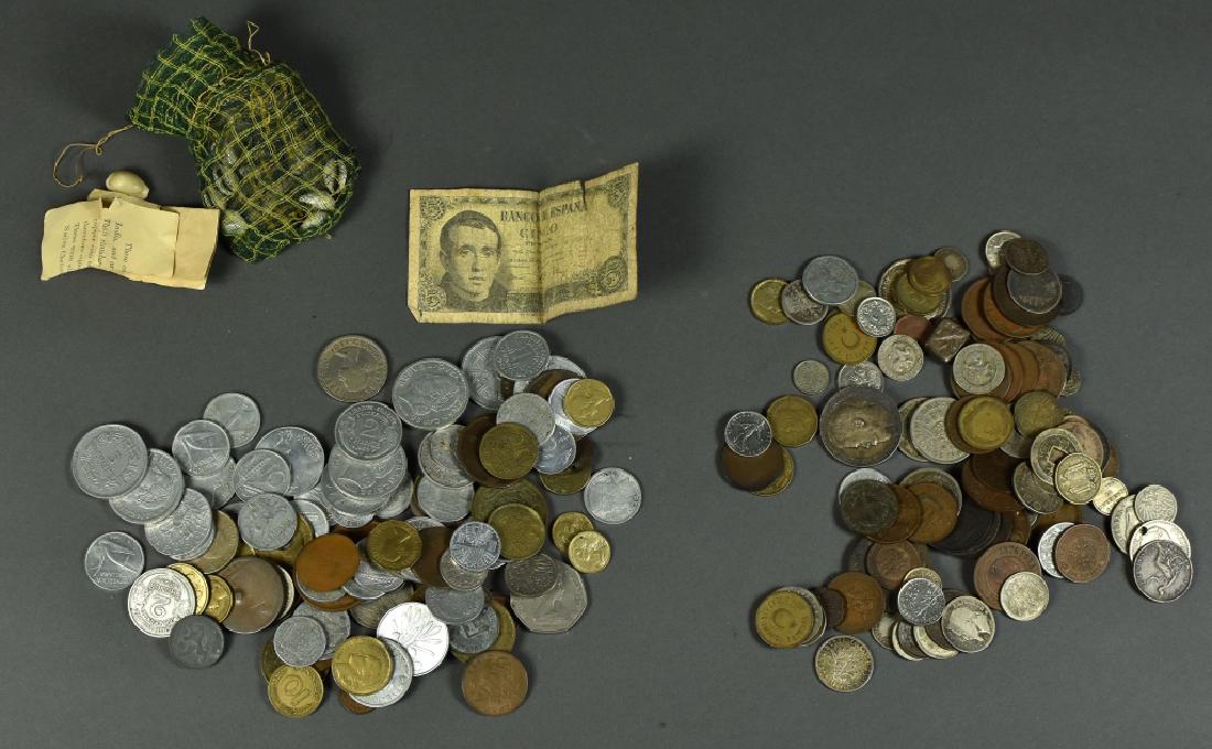 Lot of Foreign Coins Mostly 1940's European Aluminum: Mostly 1940's European Aluminum with some heavily worn 19th century coins. Some silver issues. Also a small bag of cowry shells with note on how these were used as currency and the accepted exchange r