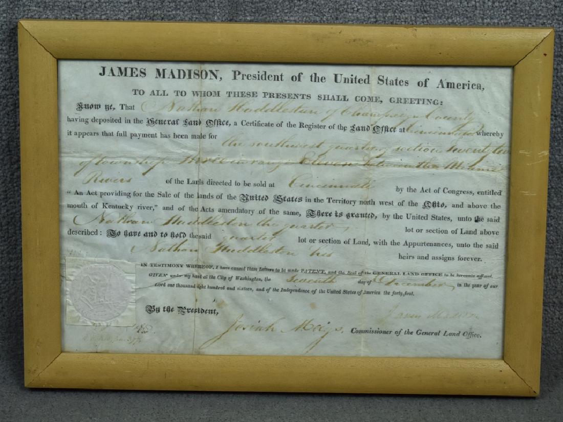 1816 US Land Sale Deed Singed by Pres. J. Madison For: For land in Ohio to Nathan Huddleston and dated Dec. 7, 1816. The Madison signature is weak. Seal intact and usual fold lines. Framed with double glass so both sides can be seen. Old family tag attach