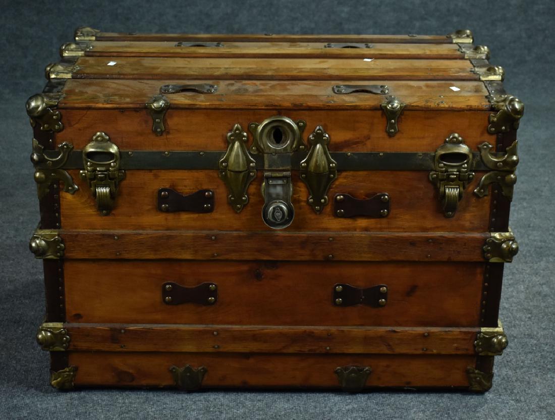 Wood and Iron Bound Flattop Trunk By Roanoke Trunk: By Roanoke Trunk Company. Also stenciled "Roanoke" on outside. 24" x 33" x 21".